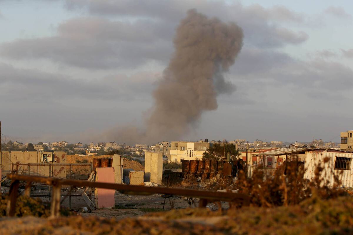 Smoke rises from the area after the Israeli army attacked Nuseirat refugee camp in Deir Al Balah, Gaza on April May 3, 2024. [Ashraf Amra - Anadolu Agency]