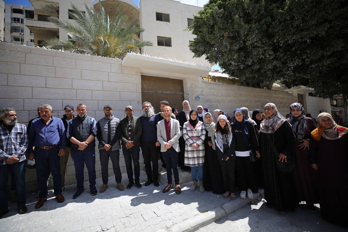 Palestinian demonstrators hold banners and placards in front of the International Red Cross and Red Crescent Movement (ICRC) building during a protest held to support the arrested Palestinians who are at the Israeli prisons, in Gaza City, Gaza on May 06, 2024. [Dawoud Abo Alkas - Anadolu Agency]