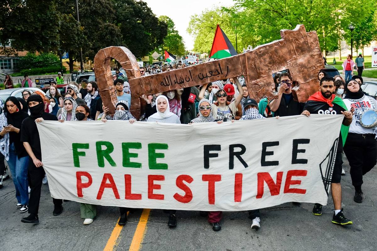Students and community members gather for a rally at the pro-Palestinian encampment on the campus of the University of Michigan during the commemoration of the 76th anniversary of Nakba Day in Ann Arbor, Michigan, United States on May 15, 2024. [Adam J. Dewey - Anadolu Agency]