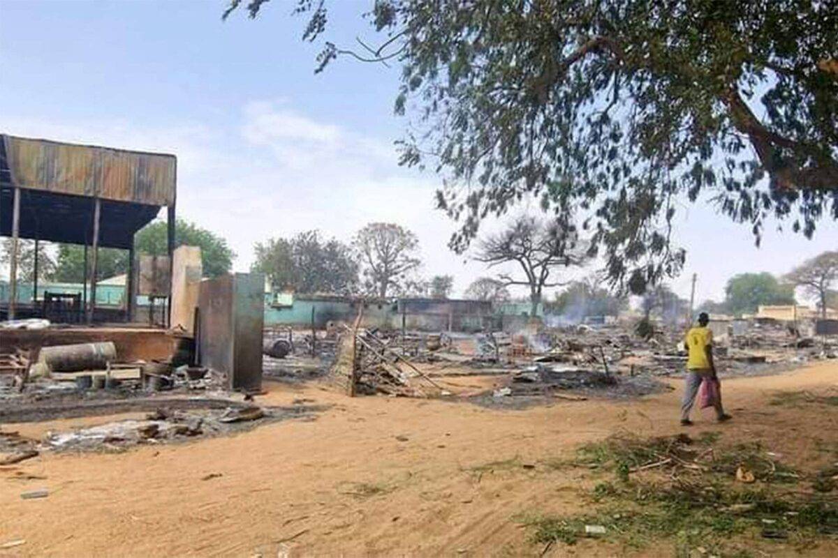 A man walks past a devastated market area in al-Fasher, the capital of Sudan's North Darfur state, on 1 September, 2023 [-/AFP via Getty Images]