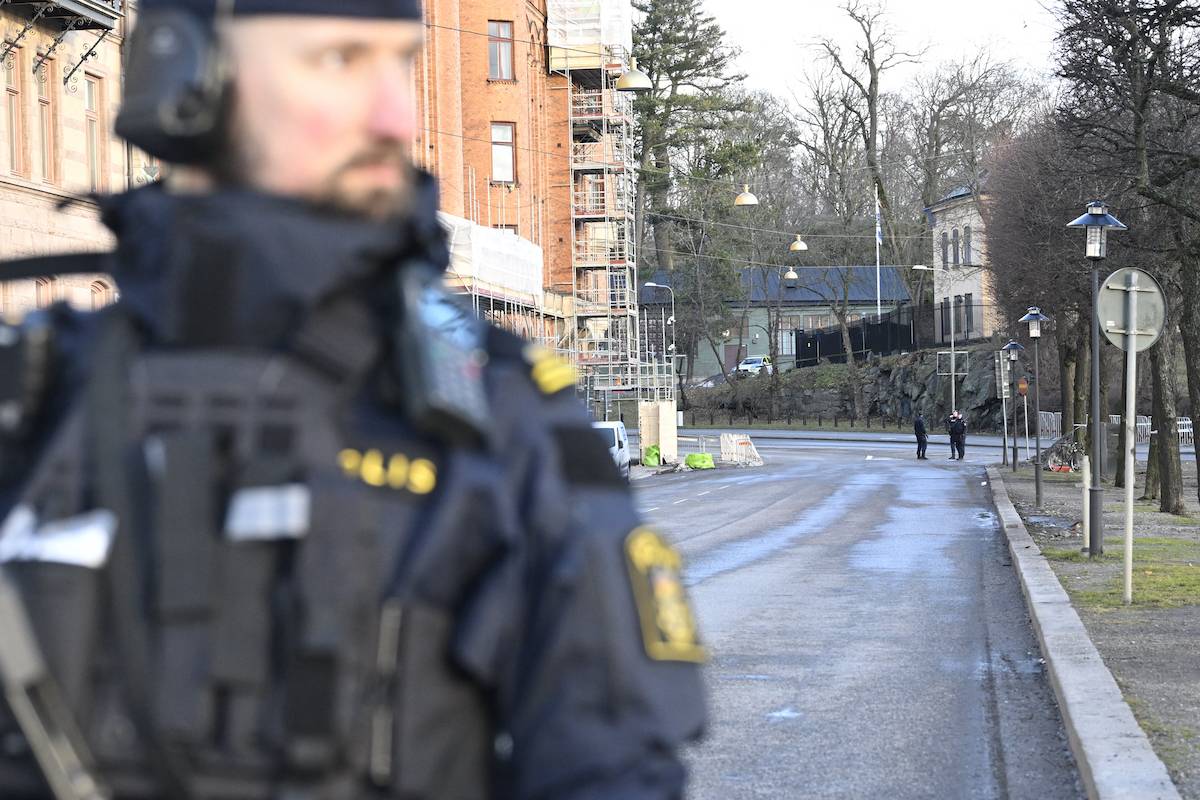 Police officers are seen outside the Israeli embassy in Stockholm, January 31, 2024. [HENRIK MONTGOMERY/TT News Agency/AFP via Getty Images]