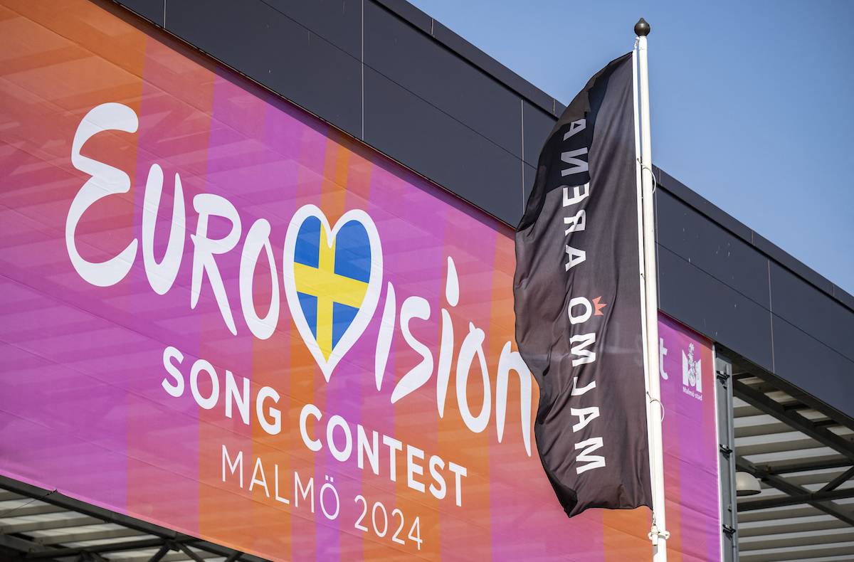 A picture taken on April 25, 2024 shows A Eurovision banner hangs outside Malmo Arena, the venue where the Eurovision song contest (ESC) will take place in Malmo, Sweden. [JOHAN NILSSON/TT NEWS AGENCY/AFP via Getty Images]