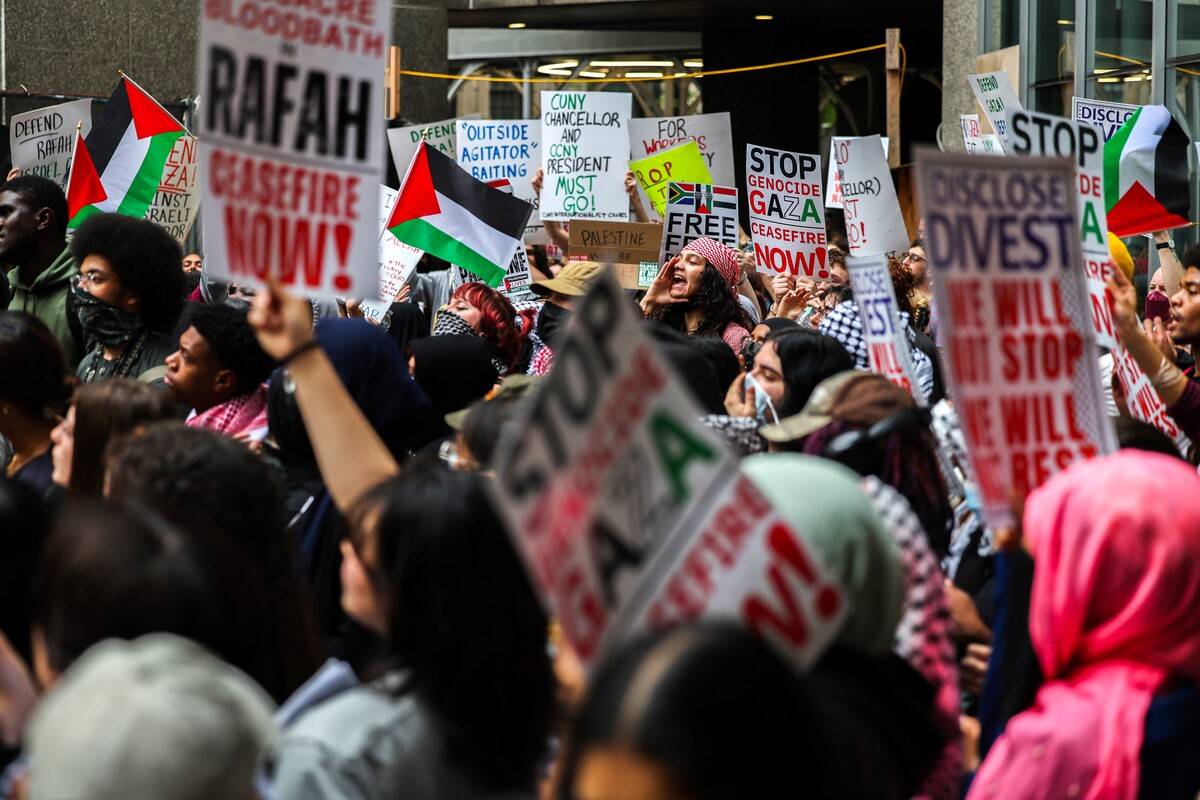 Pro-Palestinian demonstrators chant near the Met Gala at the Metropolitan Museum of Art on May 6, 2024 in New York. [Photo by CHARLY TRIBALLEAU/AFP via Getty Images]
