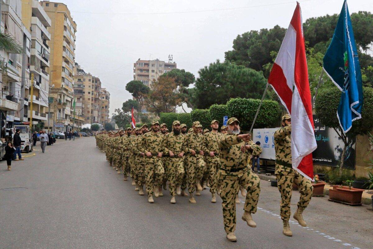 Fighters from the Lebanese Resistance Brigades, a paramilitary group affiliated with Hezbollah, march in the streets of the capital Beirut's southern suburbs, on February 14, 2020 [-/AFP via Getty Images]