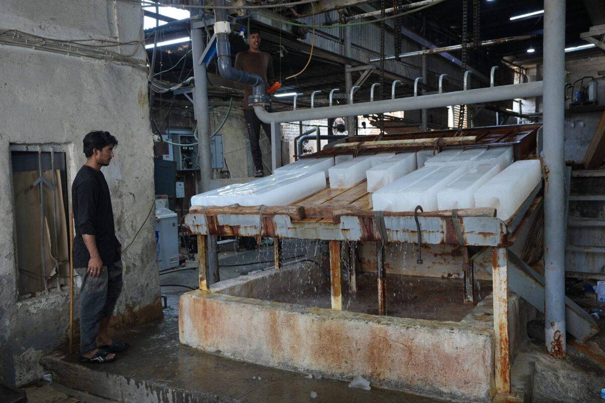 A view of piece of ice block while ice sales increased as an alternative cooling method with scorching temperatures in Baghdad, Iraq on July 29, 2029 [Murtadha Al-Sudani - Anadolu Agency]