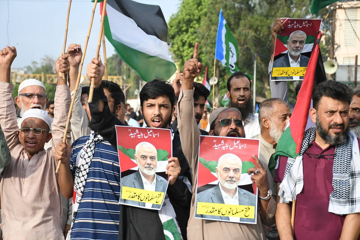 Pakistani supporters of Islamic party Jammat-e-Islami (JI) attend the funeral prayer in absentia for Hamas political chief Ismail Haniyeh in Karachi, Pakistan on July 31, 2024. [Sabir Mazhar - Anadolu Agency]