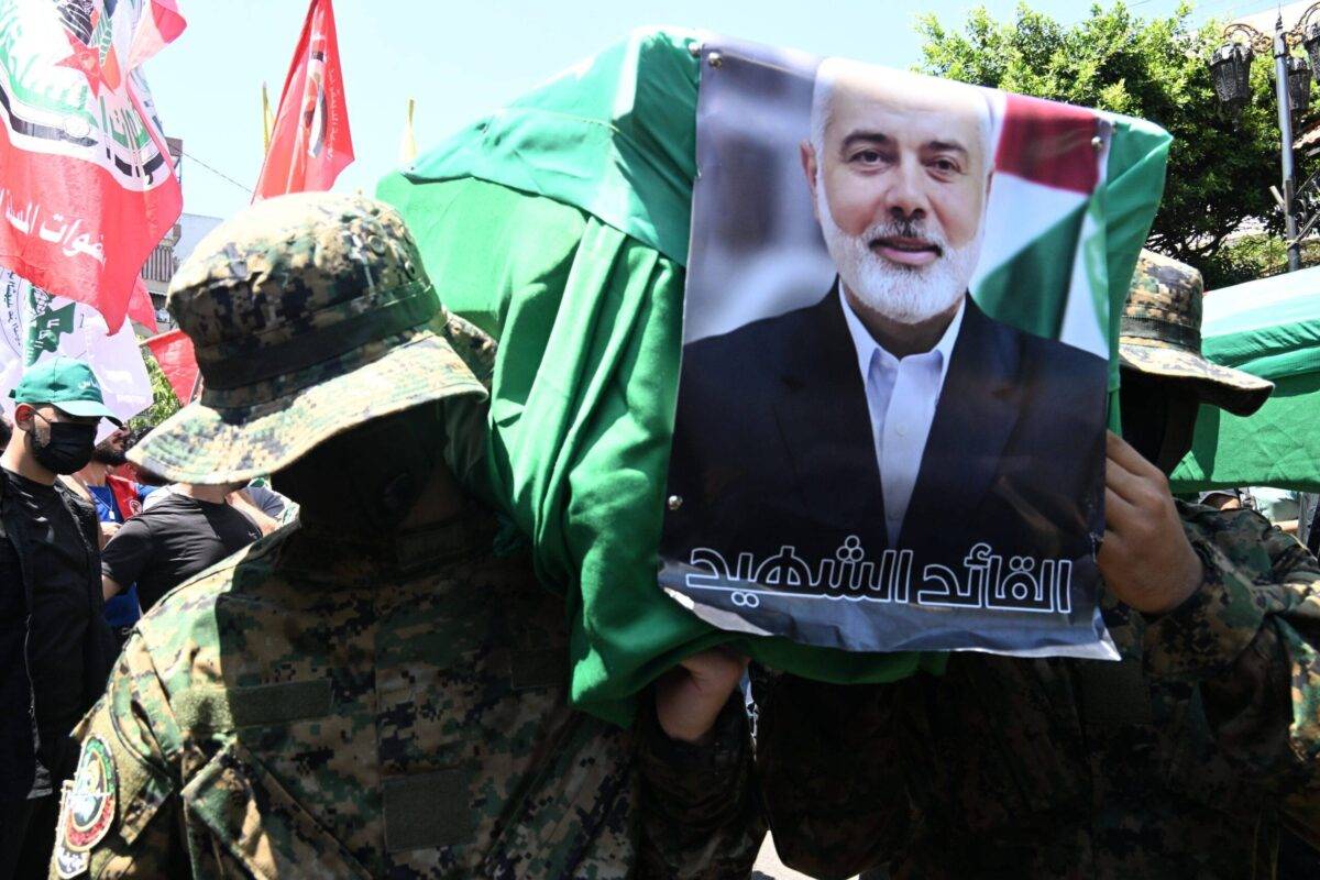 People attend funeral prayer in absentia for Hamas political chief Ismail Haniyeh, who was assassinated in Tehran, after Friday prayers at Al Imam Ali Bin Abi Taleb Mosque in Beirut, Lebanon on August 2, 2024 [Houssam Shbaro - Anadolu Agency]
