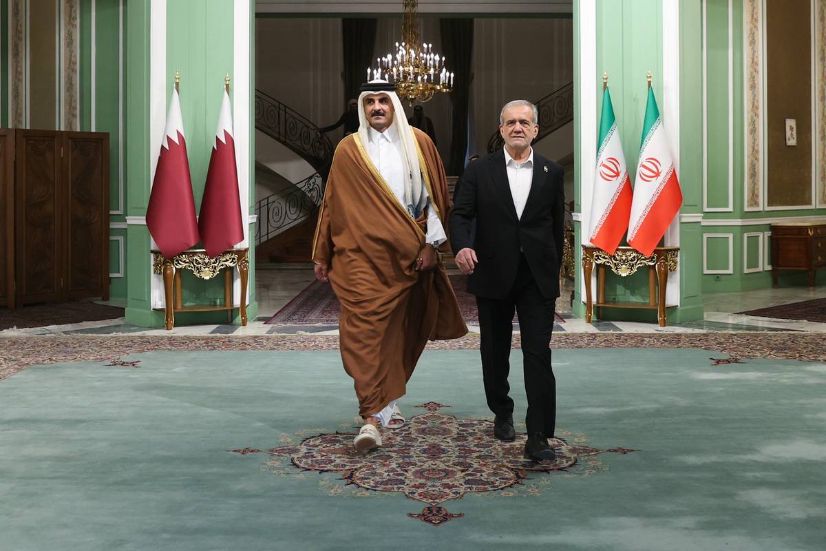 Emir of Qatar Sheikh Tamim Al Thani and Iranian President Masoud Pezeshkian hold a joint press conference after their meeting at the Sa'dabad Complex in Tehran, Iran on February 19, 2025. [Iranian Presidency / Handout - Anadolu Agency]