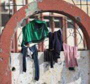 Palestinians use Gaza’s ruins to dry their laundry, on 11 April 2024 [Mohammed Asad/Middle East Monitor]