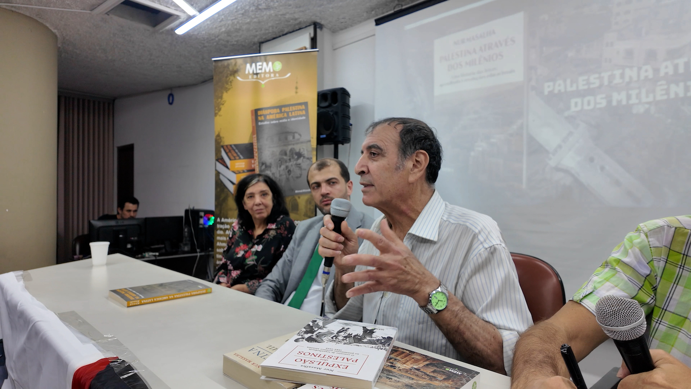 Authors Nur Masalha and Ahmad Alzoubi discuss their books published by MEMO publishers in Portuguese, in a session moderated by Professor Arlene Clemesha, director of the Center for Palestinian Studies (CEPAL), which organized the event on May 8, 2025, at the Auditorium of the Japanese Cultural Center, on the main campus of the University of São Paulo (USP), in Cidade Universitária, São Paulo, Brazil. [Salim Hassan Hassan/MEMO]