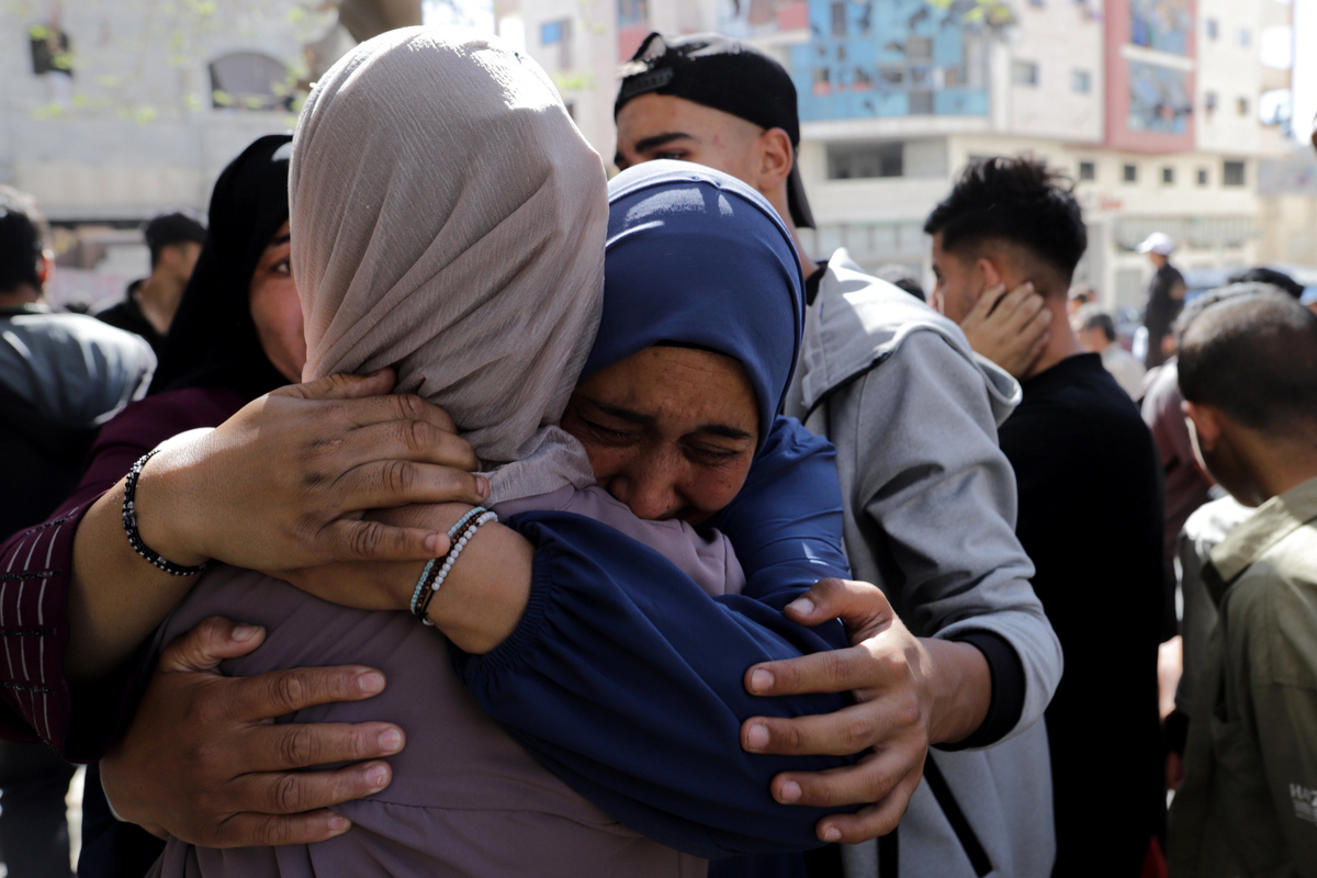 Relatives of Palestinians killed in an Israeli attack on Al-Wehda Street mourn their loss during a funeral ceremony in Gaza on May 7, 2025. [Saeed Mohammed - Anadolu Agency]