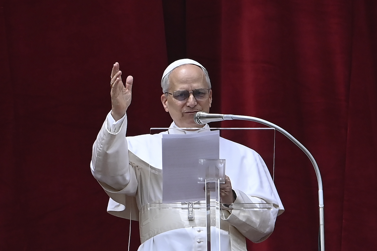 Pope Leo XIV appears at the central Loggia of St. Peter’s Basilica overlooking St. Peter’s Square to recite the Regina Caeli prayer, at the Vatican, May 11, 2025. [Isabella Bonotto - Anadolu Agency]