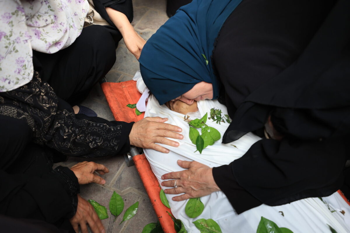 Palestinians mourn for Yusuf Mohammed al-Rizq, who was born while his mother was in an Israeli prison, after he was killed in Israeli attack on his home in the Al-Sabra neighborhood in Gaza Strip on July 12, 2025. [Dawoud Abo Alkas - Anadolu Agency]