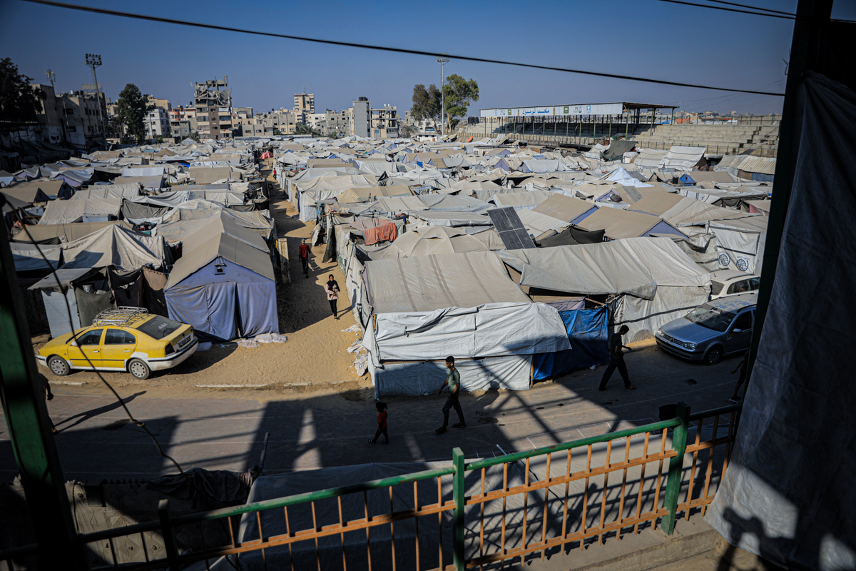 Palestinian children who lost their homes due to Israeli attacks struggle to survive under harsh conditions in tents at the Yarmouk Camp in Gaza City, Gaza on July 21, 2025. [Ahmed Jihad Ibrahim Al-arini - Anadolu Agency]