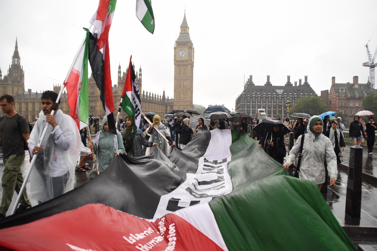 Pro-Palestinian demonstrators march past Big Ben as they march from Embankment Station during the 28th protest held since October 7, 2023, calling for an end to UK arms sales to Israel and condemning Israel’s attacks on Gaza as well as crackdowns on Palestinian solidarity in the UK on July 29, 2025 in London, United Kingdom. [Behlül Çetinkaya - Anadolu Agency]