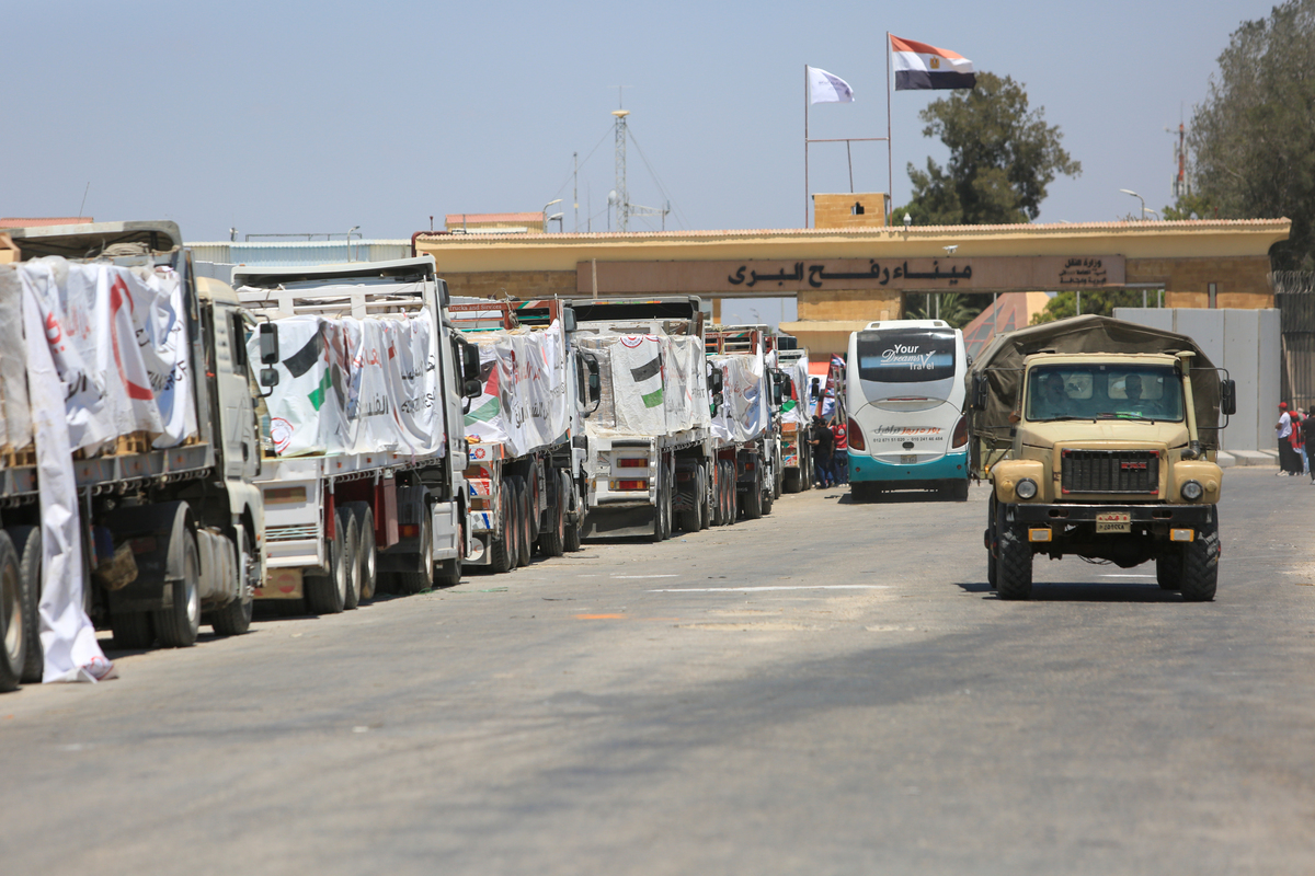 Aid trucks loaded with humanitarian supplies remain stranded at the Rafah Border Crossing on the Egyptian side due to Israeli attacks and closed border crossings, the delivery of aid is limited and delayed in Rafah, Egypt on August 6, 2025. [Mohamed Elshahed - Anadolu Agency]