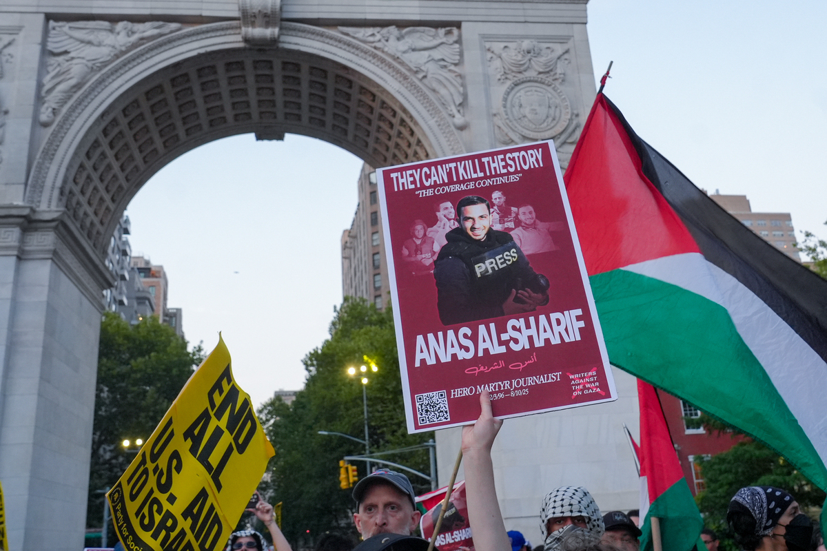 Demonstrators rally outside the New York Times, accusing the paper of being complicit in providing coverage for the Israel's attacks on Gaza and protesting the killing of journalists in Gaza by Israeli forces in New York, USA, on August 12, 2025. [Selçuk Acar - Anadolu Agency]