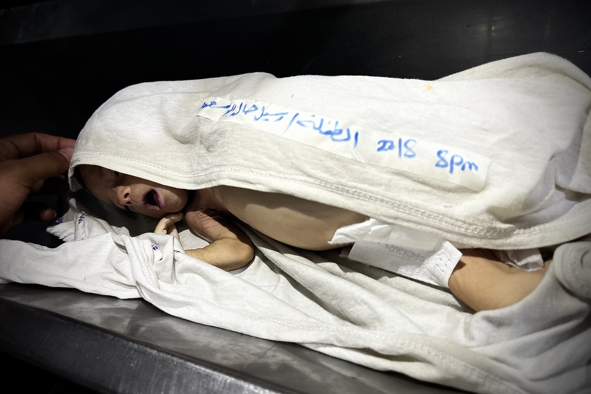 Body of 2-month-old Palestinian baby Rasil Ebu Mesud, who lost his life due to malnutrition, is brought to Nasser Hospital for funeral process as Israeli food blockade continues in Khan Yunis, Gaza on August 22, 2025. [Hani Alshaer - Anadolu Agency]