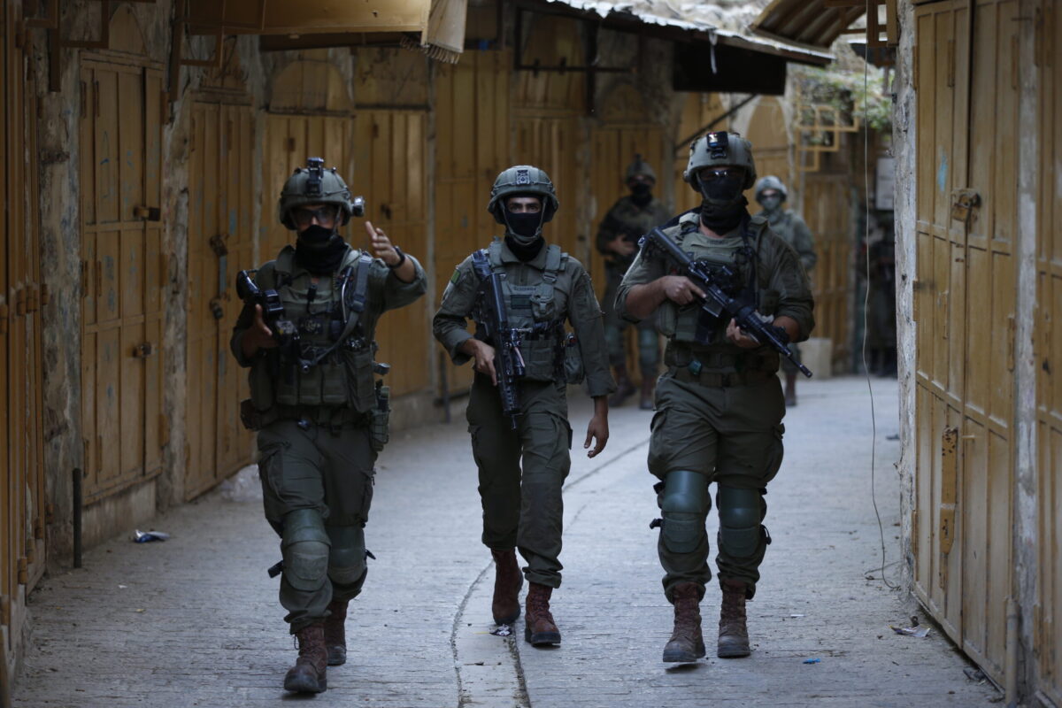 Israeli occupation forces raid six schools in Hebron, detain teachers