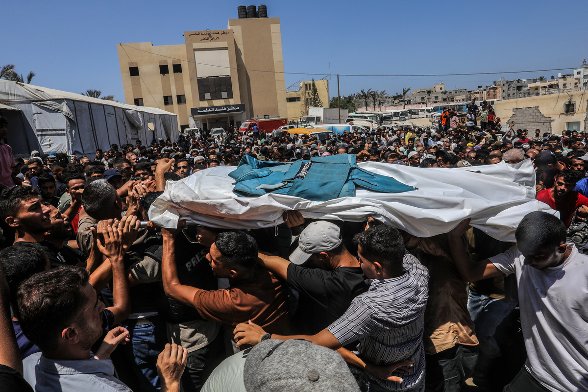 A funeral ceremony is being held in the courtyard of Nasser Hospital for Reuters photojournalist Hossam al-Masri, Al Jazeera cameraman Mohammed Salameh, journalist Maryam Abu Deqqa, who worked with several media outlets including Independent Arabia and AP, and NBC News journalist Moaz Abu Taha, all of whom were killed in an Israeli attack on the hospital in Khan Yunis, Gaza on August 25, 2025. [Abed Rahim Khatib - Anadolu Agency]