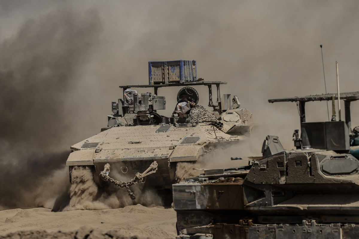 Tanks and armored vehicles belonging to the Israeli army are seen mobilizing near the Gaza border, as Israel’s attacks on the Gaza Strip continue without pause, on September 15, 2025. [Tsafrir Abayov - Anadolu Agency]