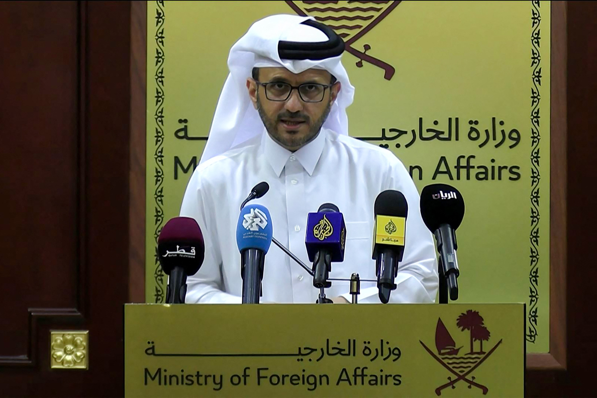 This frame grab from AFPTV footage shows Qatari foreign ministry spokesman Majed al-Ansari speaking during a media briefing in Doha on June 17, 2025.[Photo by JACQUELINE PENNEY/AFPTV/AFP via Getty Images]