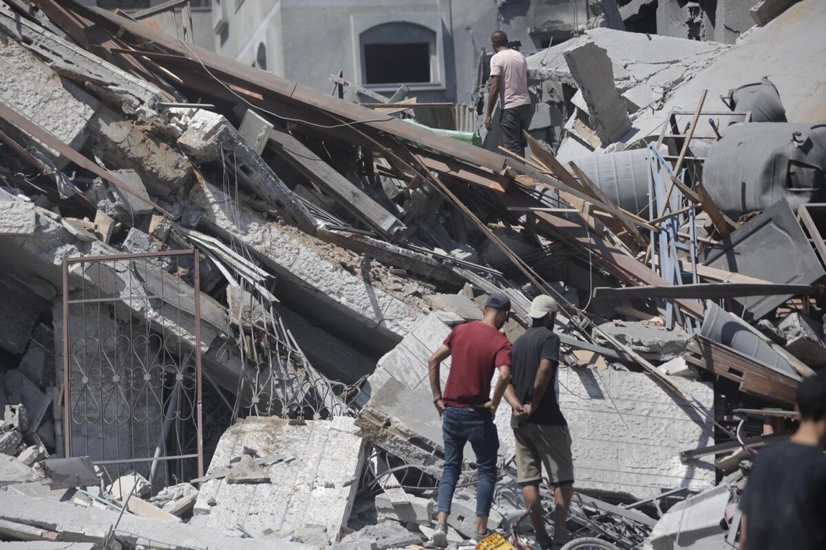 Major destruction after residential tower and busy market is targeted in Gaza by Israeli airstrikes.[Mohammed Asad/Middle East Monitor]