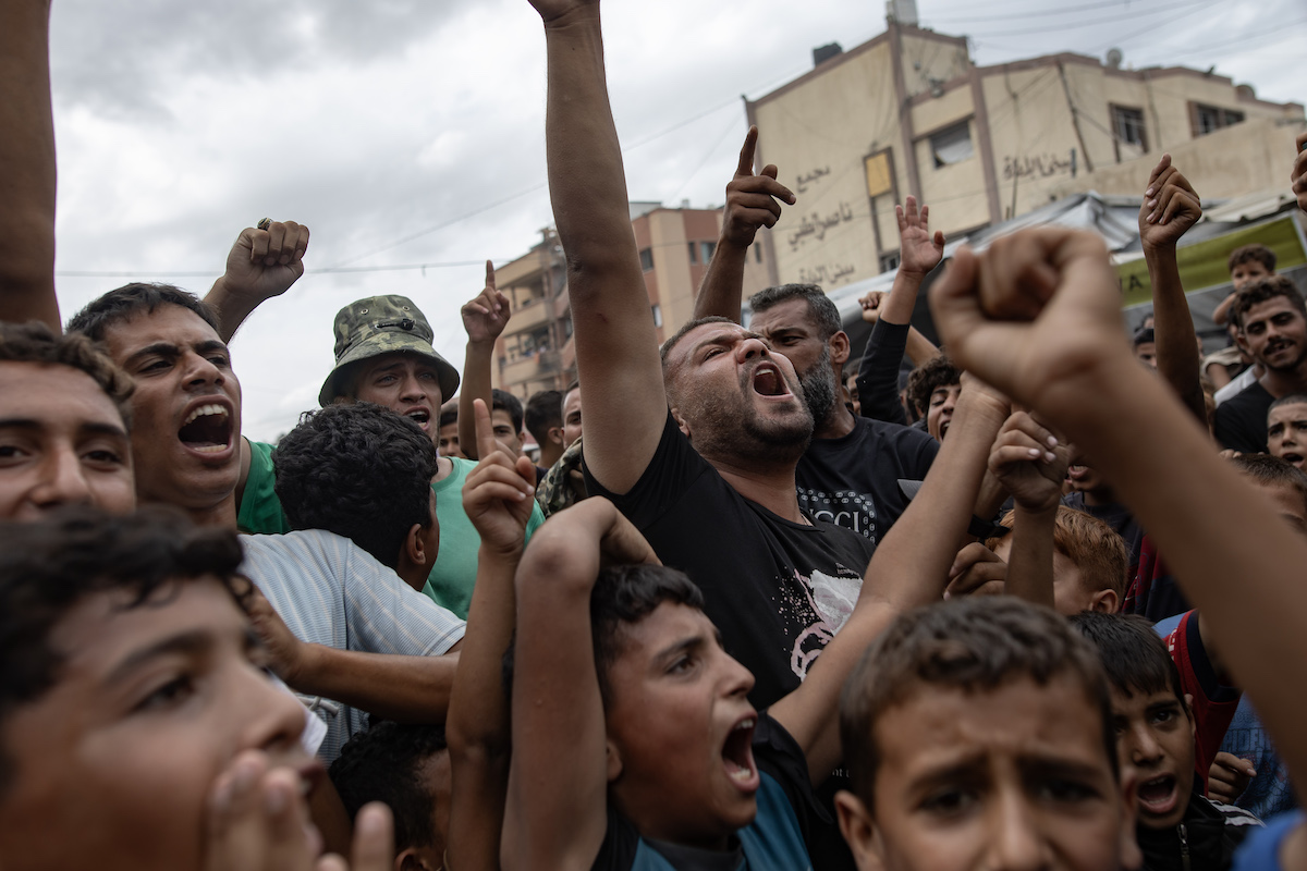Palestinians gather to celebrate following the announcement of a ceasefire agreement expected to take effect in the Gaza Strip on October 9, 2025, in Khan Yunis, Gaza. [Doaa Albaz - Anadolu Agency]