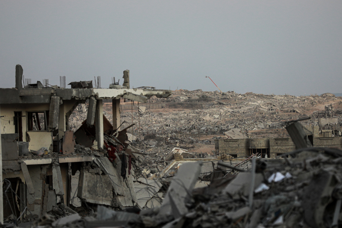 Thousands of Palestinians return to homes in Gaza City after ceasefire ...