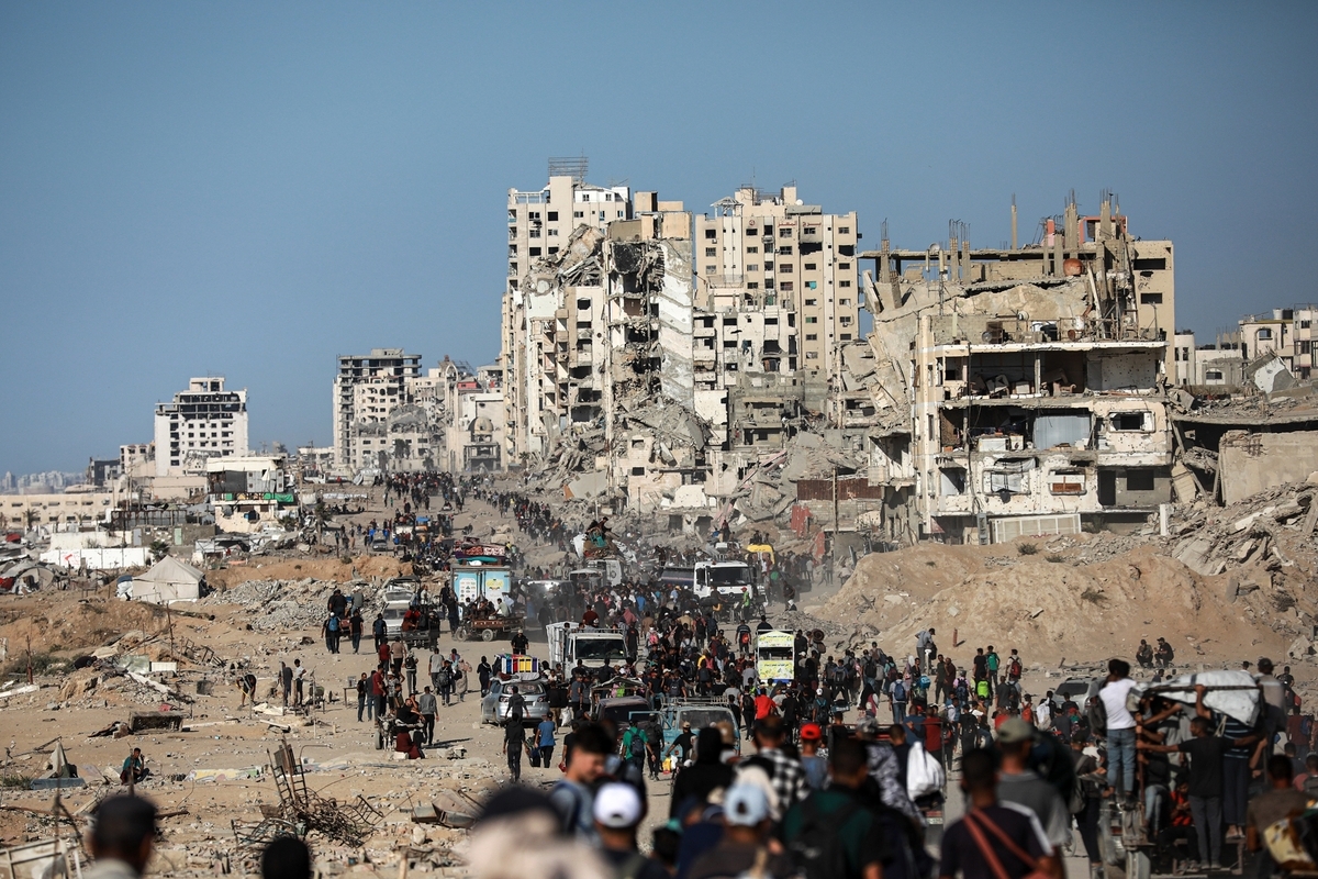 Thousands of Palestinians return to homes in Gaza City after ceasefire ...
