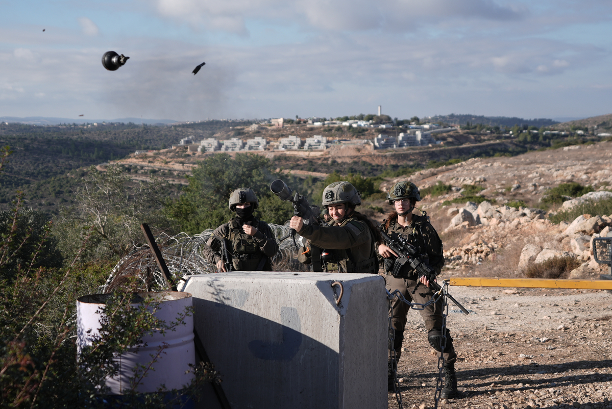Israeli soldiers open fire on Palestinian farmers attempting to reach their fields for the olive harvest in the village of Kuber, near Ramallah, West Bank on October 18, 2025. [Issam Rimawi - Anadolu Agency]