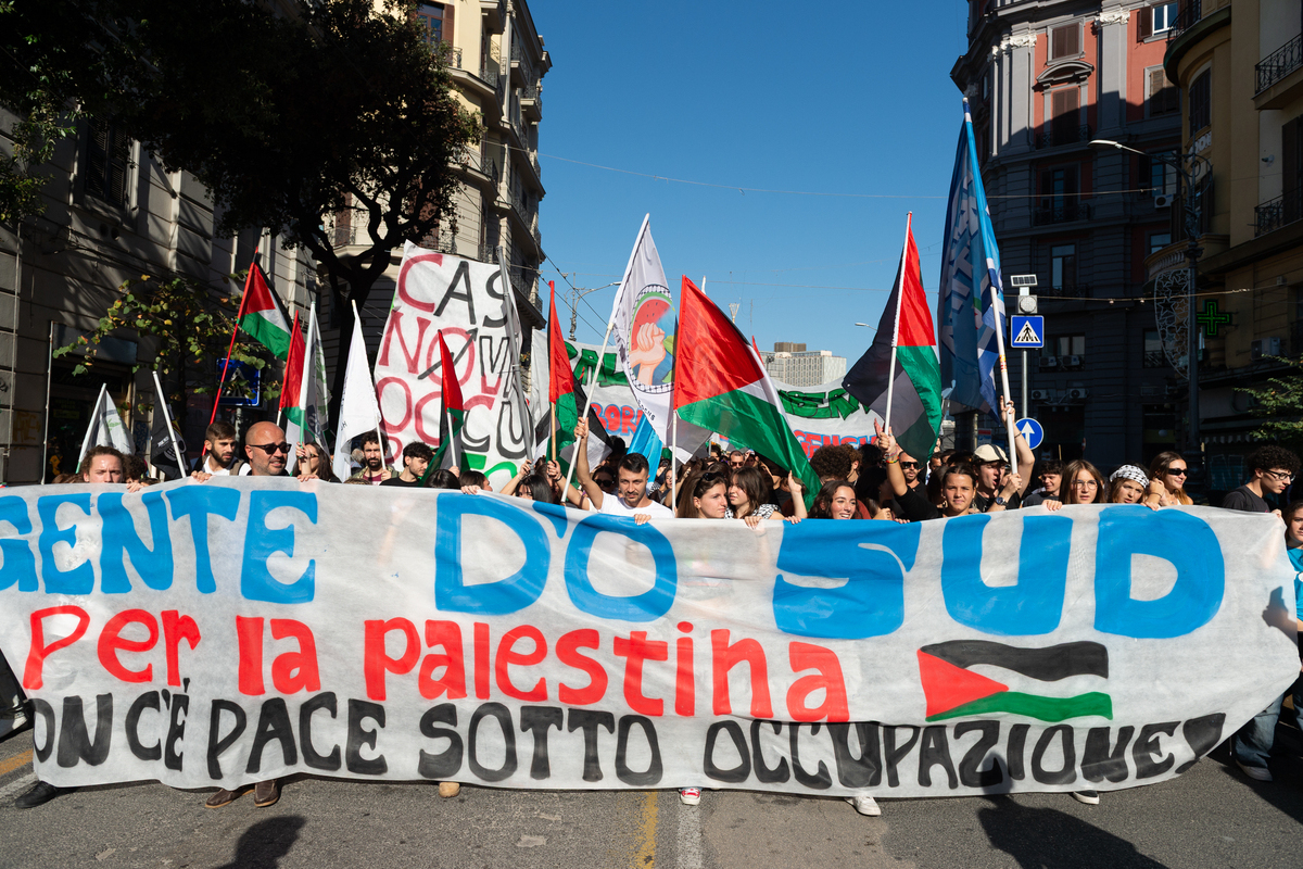 Protesters holding banners and Palestinian flags take part in a Pro-Palestinian demonstration in Naples, on October 18, 2025 calling for an end to the Israeli attacks and the war in Gaza. [Eliano Imperato - Anadolu Agency]