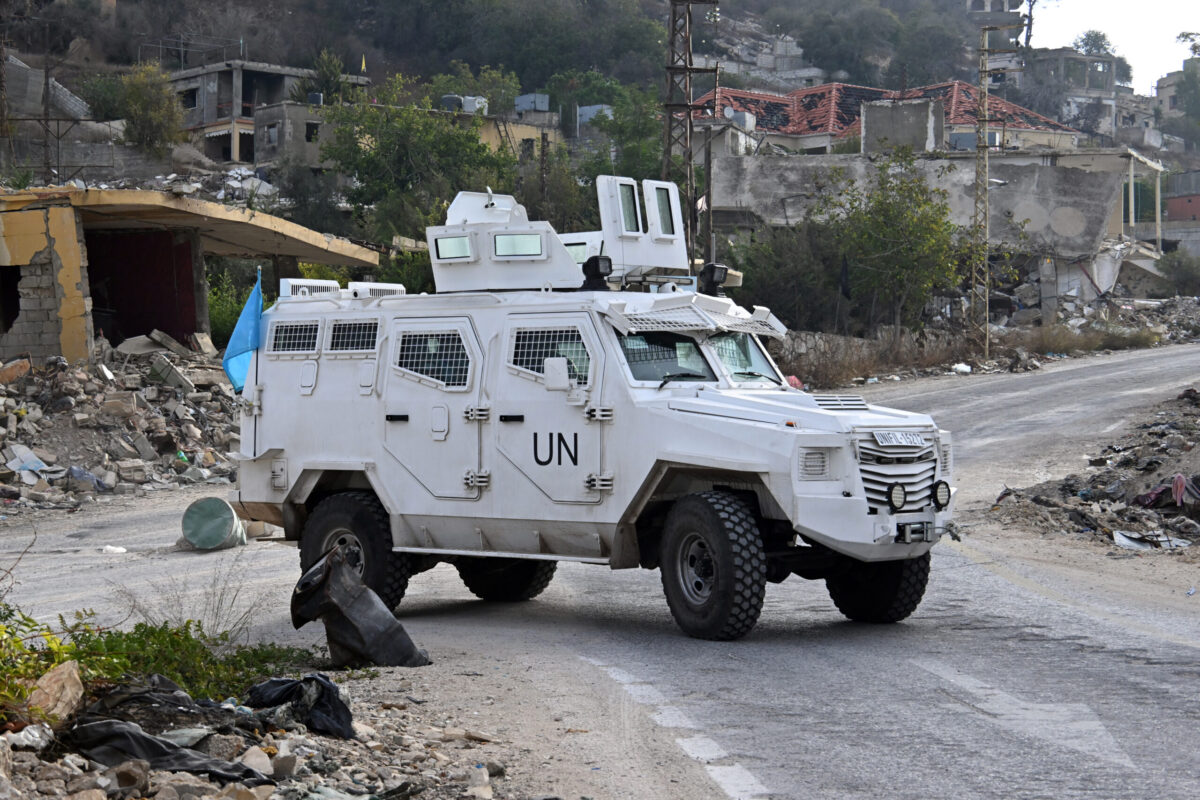 Clashes and attacks along the Israeli border in southern Lebanon prevent locals from carrying out the long-awaited olive harvest, as residents of Aadaysit in Nabatieh manage to collect olives under the protection of United Nations Interim Force In Lebanon (UNIFIL), on October 20, 2025. [Houssam Shbaro - Anadolu Agency]