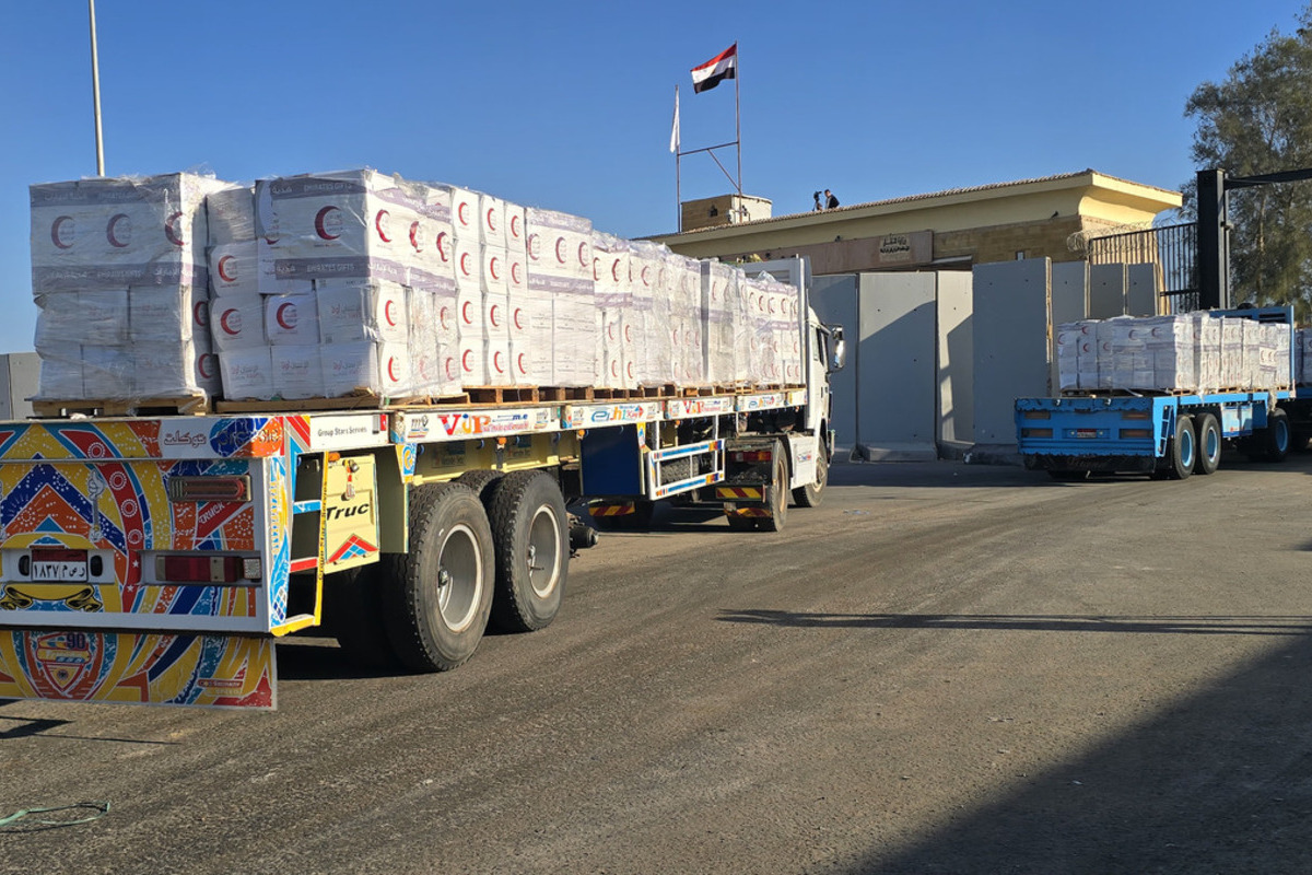 A new convoy of trucks carrying humanitarian aid cross into the Gaza Strip through the Rafah Border Crossing, following the implementation of the ceasefire between Israel and Hamas, seen from Rafah, Egypt on October 27, 2025. [Ahmed Sayed - Anadolu Agency]
