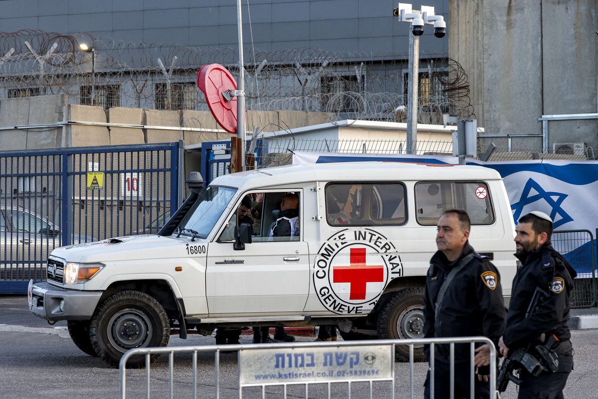 A vehicle of the International Committee of the Red Cross (ICRC) arrives outside Ofer military prison, located between Ramallah and Beitunia in the occupied West Bank, on January 19, 2025. [Photo by JALAA MAREY/AFP via Getty Images]