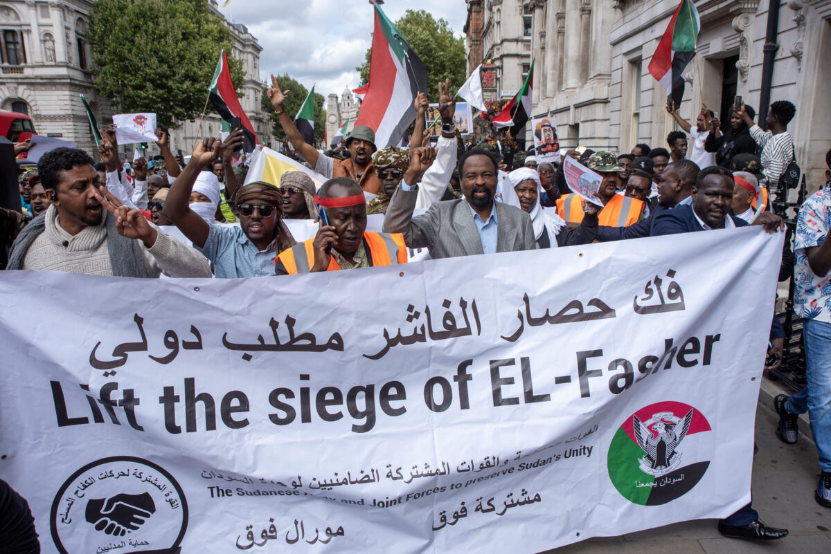 Protesters hold a banner that says to 'Lift the siege of El-Fasher' because of the ongoing battle for a town called El-Fasher in North Darfur during the demonstration, on 30 August 2025 [Krisztian Elek/SOPA Images/LightRocket via Getty Images]