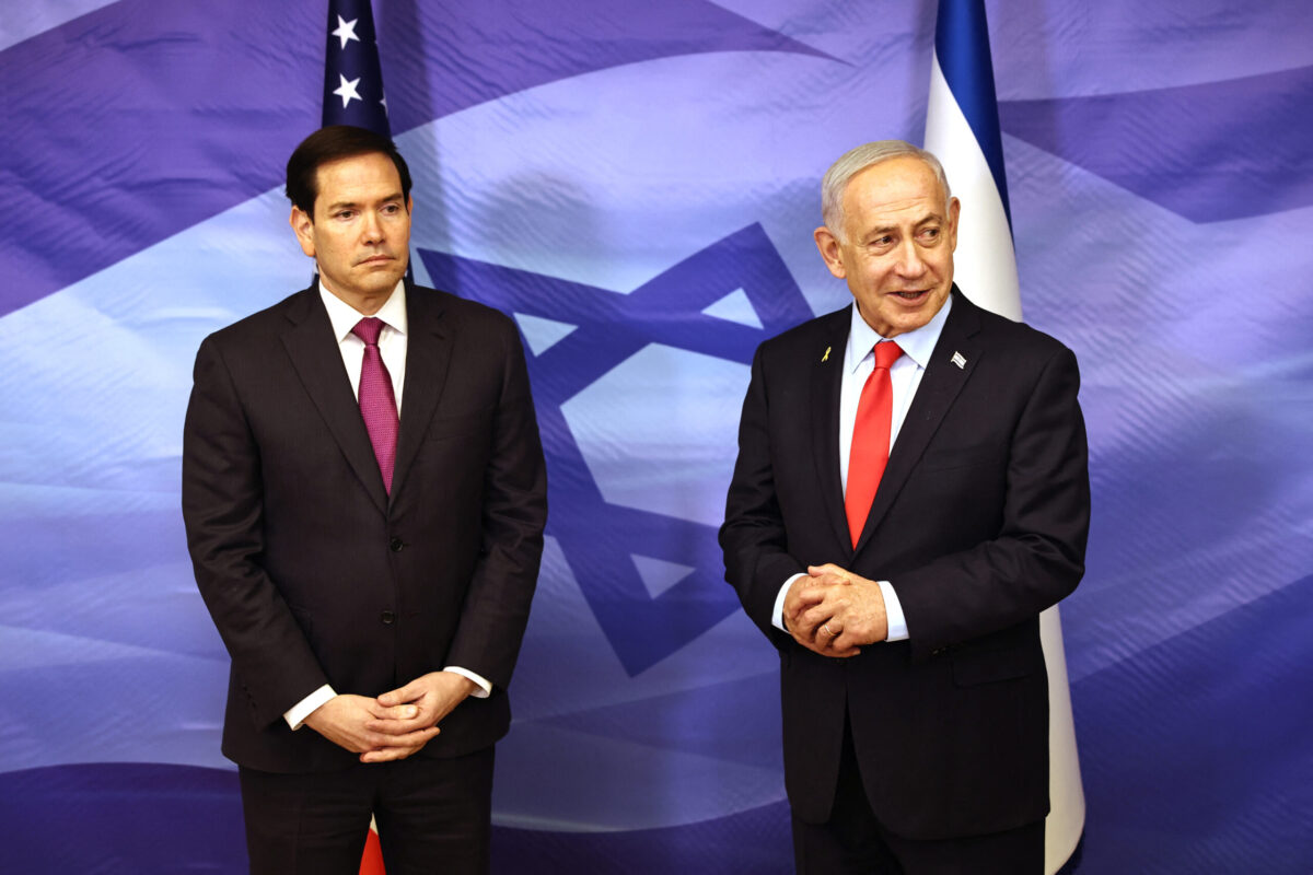US Secretary of State Marco Rubio (L) looks on as Israeli Prime Minister Benjamin Netanyahu speaks following their meeting at the Prime Minister's office in Jerusalem on October 23, 2025. [FADEL SENNA/POOL/AFP via Getty Images]