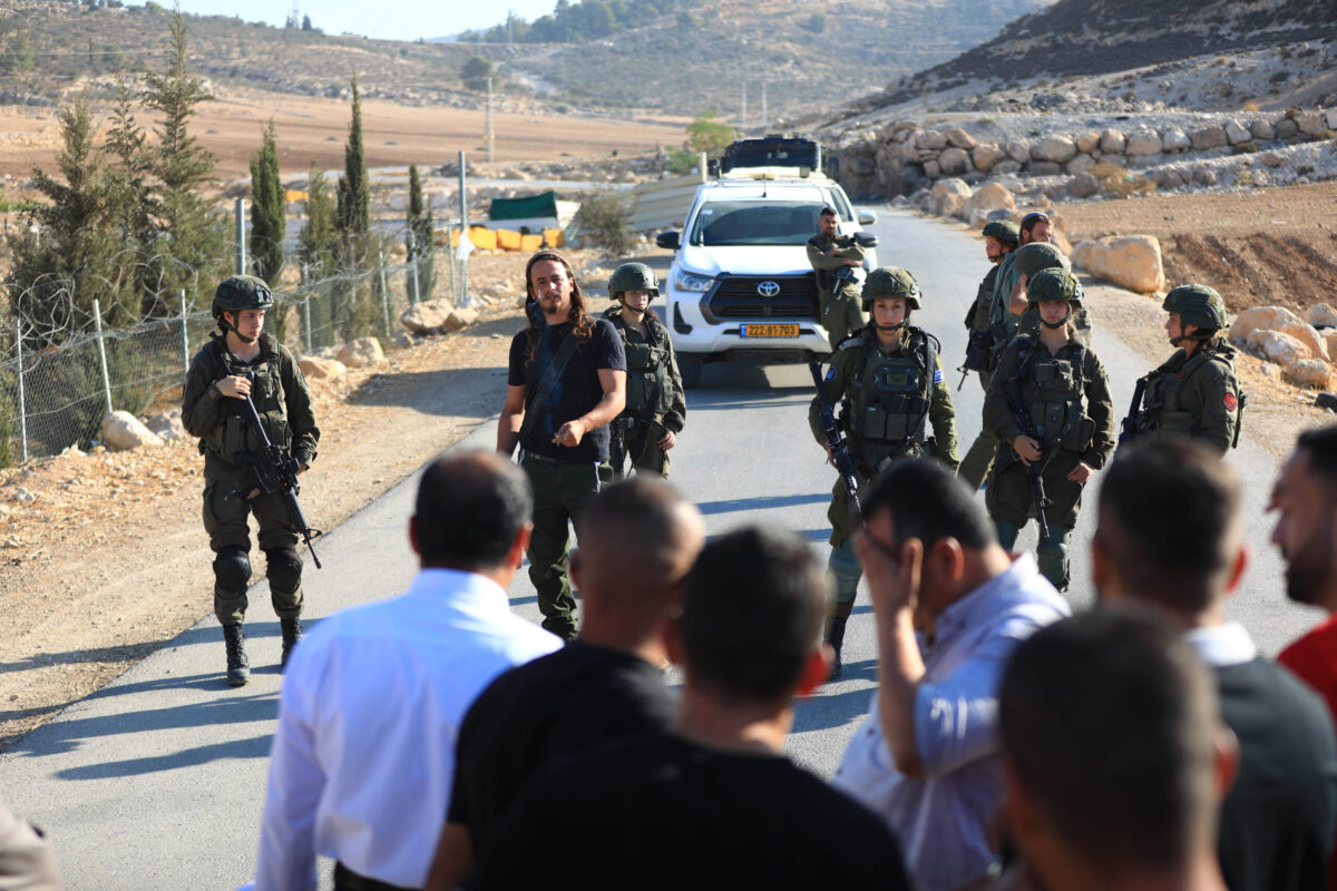 The Israeli army intervenes with tear gas and sound bombs against Palestinian farmers trying to access their own land in the al-Jalatiya area of Idhna, west of Hebron in the West Bank on November 3, 2025. [Wisam Hashlamoun/Getty Images]