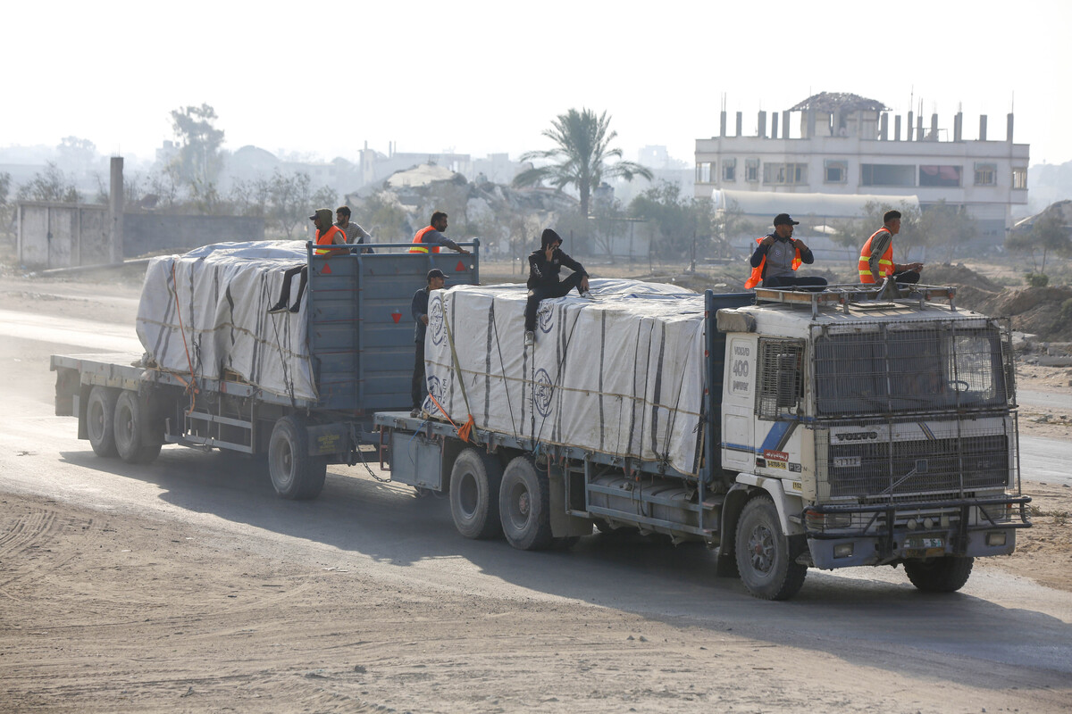 Trucks carrying food and fuel are passing through the Kissufim Border Crossing and heading towards Gaza under the ceasefire agreement between Israel and Hamas and reach the Gaza Strip in Deir al-Balah, Gaza on November 06, 2025. [Mohammed Nassar - Anadolu Agency]