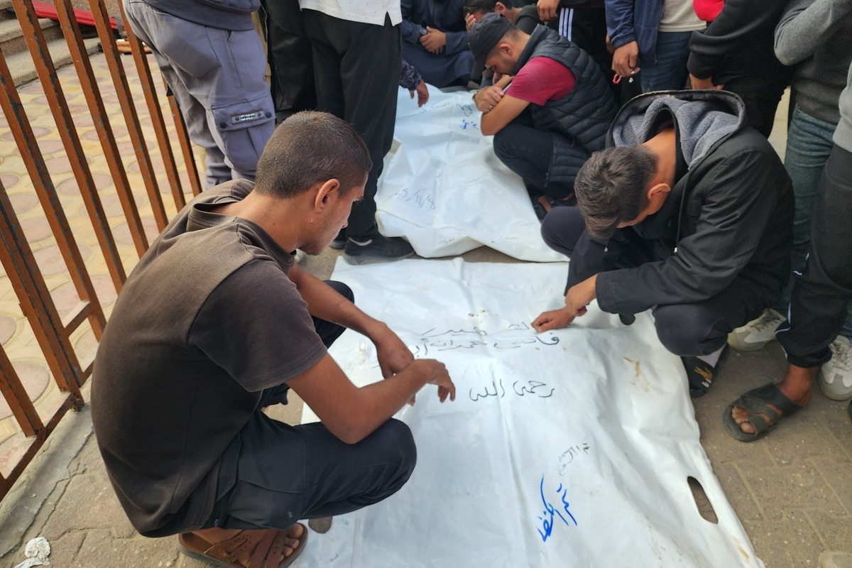 People attend the funeral ceremony at Nasser Hospital for eight Palestinians after an Israeli attack on November 9, 2025, in Khan Yunis, Gaza. [Hani Alshaer - Anadolu Agency]
