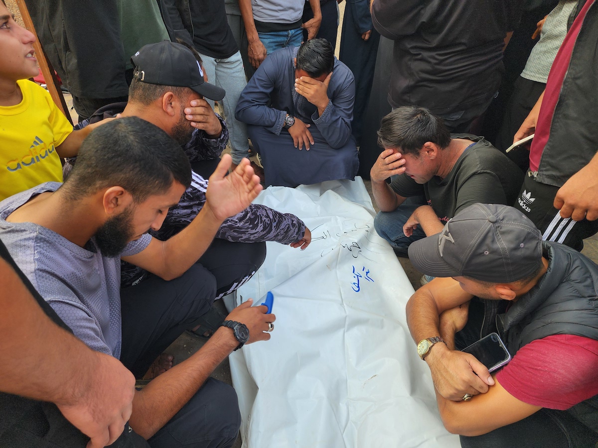 People attend the funeral ceremony at Nasser Hospital for eight Palestinians, including six al-Qassam Brigade members, after an Israeli attack on November 9, 2025, in Khan Yunis, Gaza. [Hani Alshaer - Anadolu Agency]
