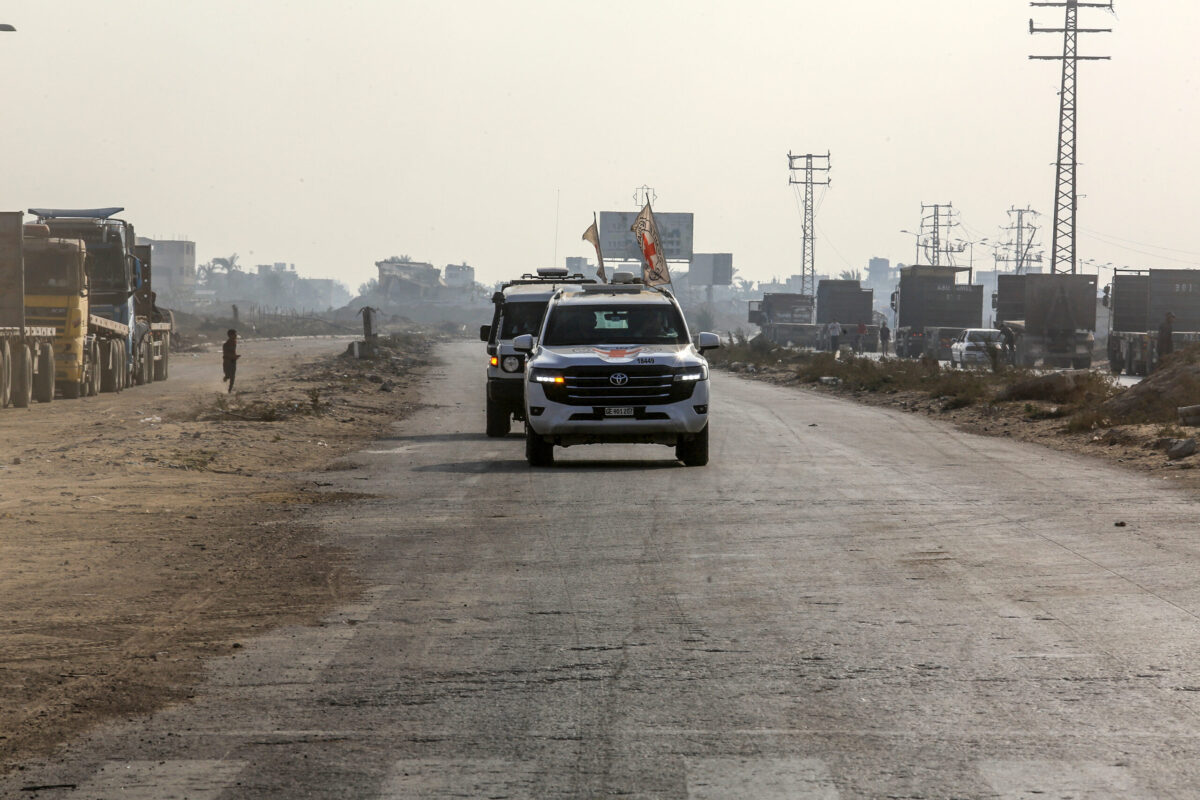 An International Committee of the Red Cross (ICRC) team transports the coffin believed to contain the remains of Israeli soldier Hadar Goldin toward the Kissufim Crossing after receiving it from Hamas, in Khan Yunis, Gaza, on October 09, 2025.[Abed Rahim Khatib - Anadolu Agency]