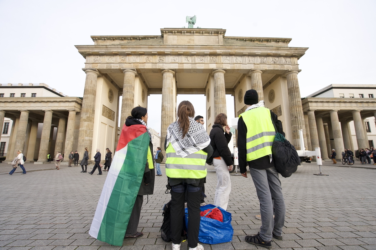 Activists climb iconic Brandenburg Gate to protest Germany’s ‘complicity’ in Gaza genocide