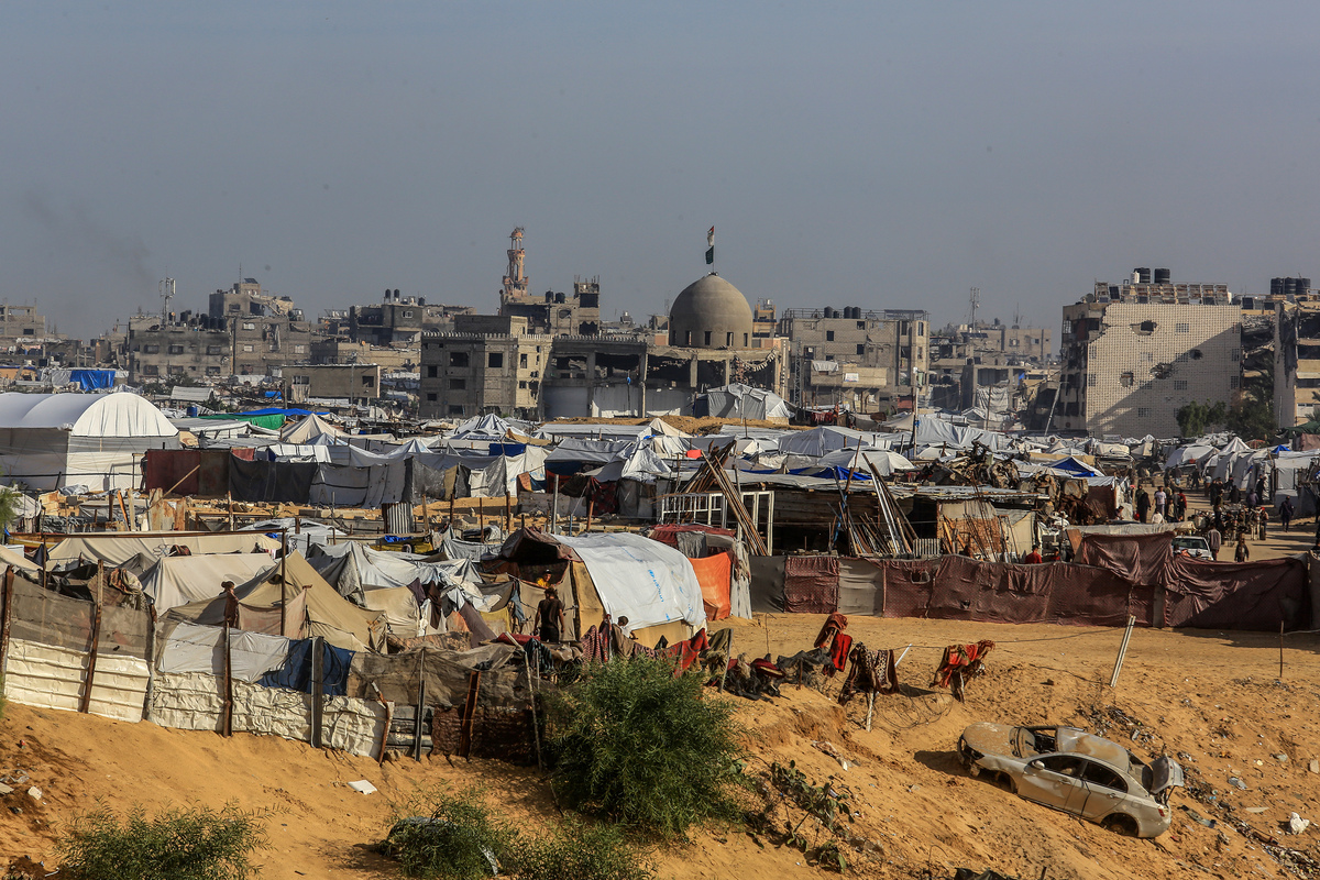 Displaced Palestinian families living in makeshift tents near the city of Rafah in the southern Gaza Strip face increasingly dire living conditions due to adverse weather and inadequate shelter, on November 17, 2025. [Abed Rahim Khatib - Anadolu Agency]