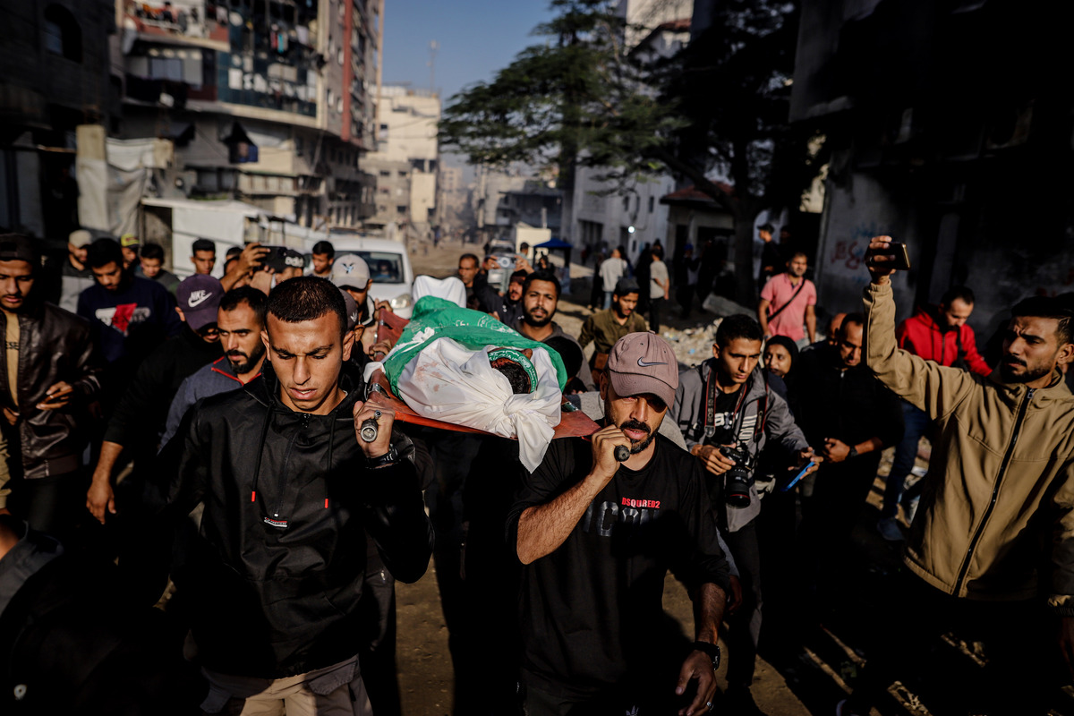 Bodies of Palestinians killed in the Israeli strikes on Gaza City’s Zeitoun neighborhood, including children, were brought to al-Shifa Hospital in the city for funeral procedures in Gaza City, Gaza on November 20, 2025. [Saeed M. M. T. Jaras - Anadolu Agency]