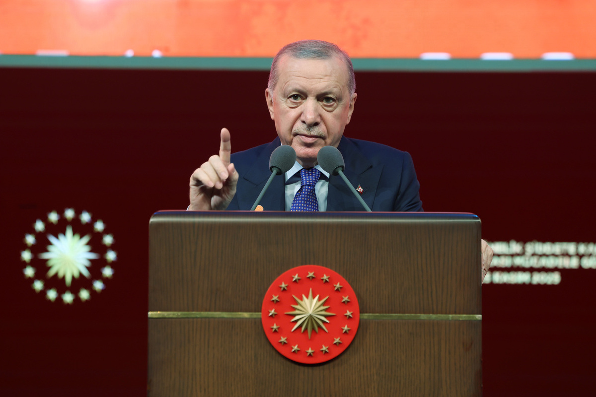 Turkish President and leader of AK Party Recep Tayyip Erdogan makes a speech as he attends the International Day for the Elimination of Violence Against Women program at the Bestepe Nation Congress and Culture Center in Ankara, Turkiye on November 25, 2025. [TUR Presidency / Mustafa Kamaci - Anadolu Agency]