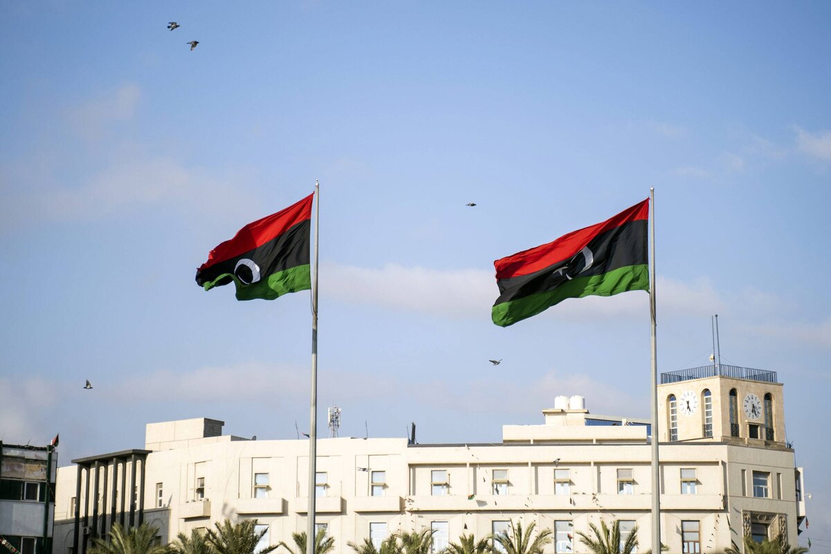Two Libyan flags at Martyrs square in Tripoli, Libya [Getty]