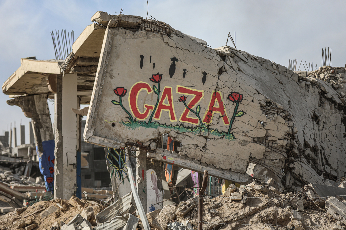 Palestinian artists living in the Maghazi Camp in the central Gaza Strip have transformed the rubble of homes destroyed in Israeli attacks into vibrant, colorful works of art on October 08, 2025. [Adam Bilal - Anadolu Agency]