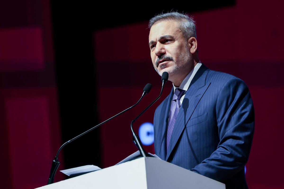 Turkish Foreign Minister Hakan Fidan delivers a speech at the 9th International Al Sharq Youth Conference, held at a hotel in Istanbul, Turkiye on December 13, 2025. [Murat Gök - Anadolu Agency]
