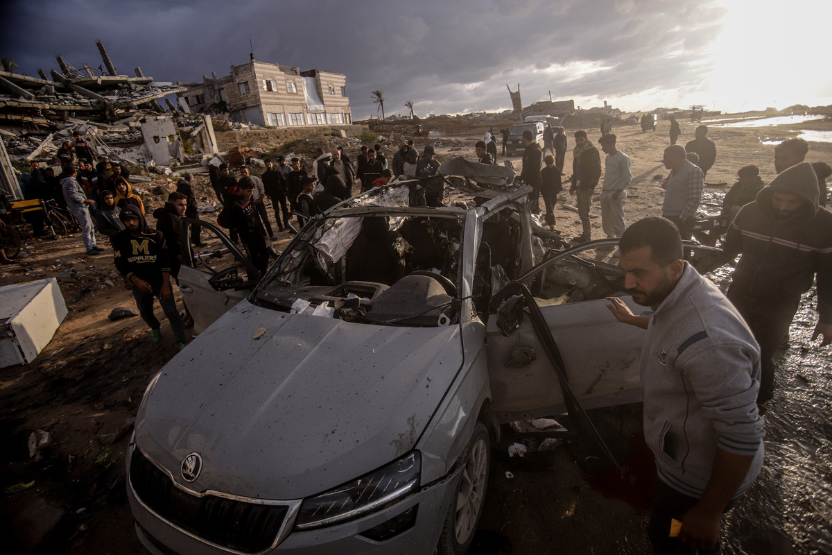 Four Palestinians lost their lives after an Israeli airstrike that targeted a vehicle at Al-Rashid Al-Bahri Street in the western part of Gaza City, Gaza on December 13, 2025. [Saeed M. M. T. Jaras - Anadolu Agency]